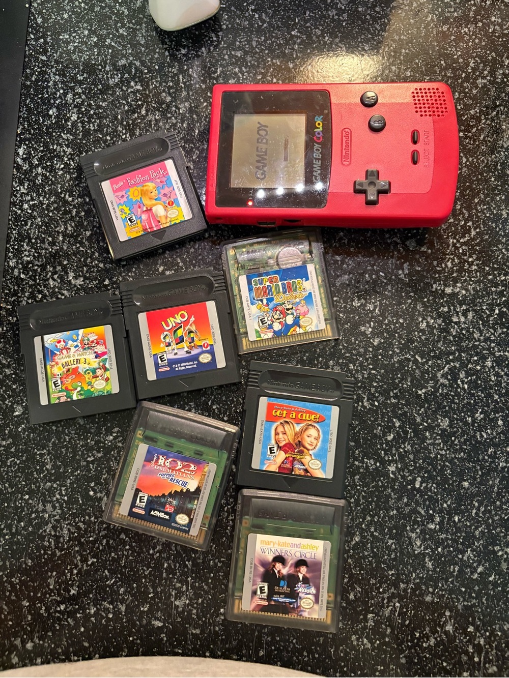 Nintendo Game Boy Color Red/Pink Handheld Console with Assorted Game Pak Lot